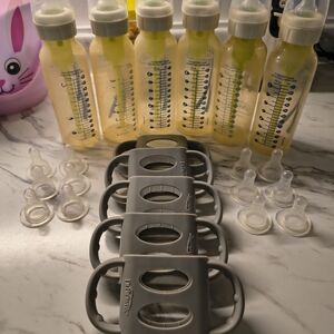 Dr. Brown's Baby Bottles with Gray Handles and Size 1,2&3 Nipples.